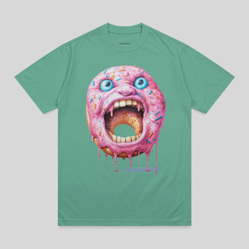 T-shirt with a monstrous, screaming pink donut with blue eyes and sprinkles.