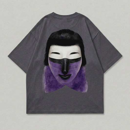 Dark grey t-shirt with a graphic of a stylized face with purple paint and black hair.