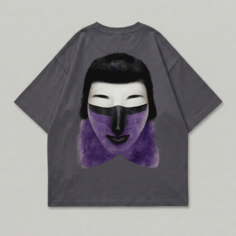 Dark grey t-shirt with a graphic of a stylized face with purple paint and black hair.