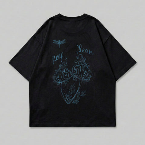 Black t-shirt with a blue dragonfly and floral design, text reads "Keep Clean".