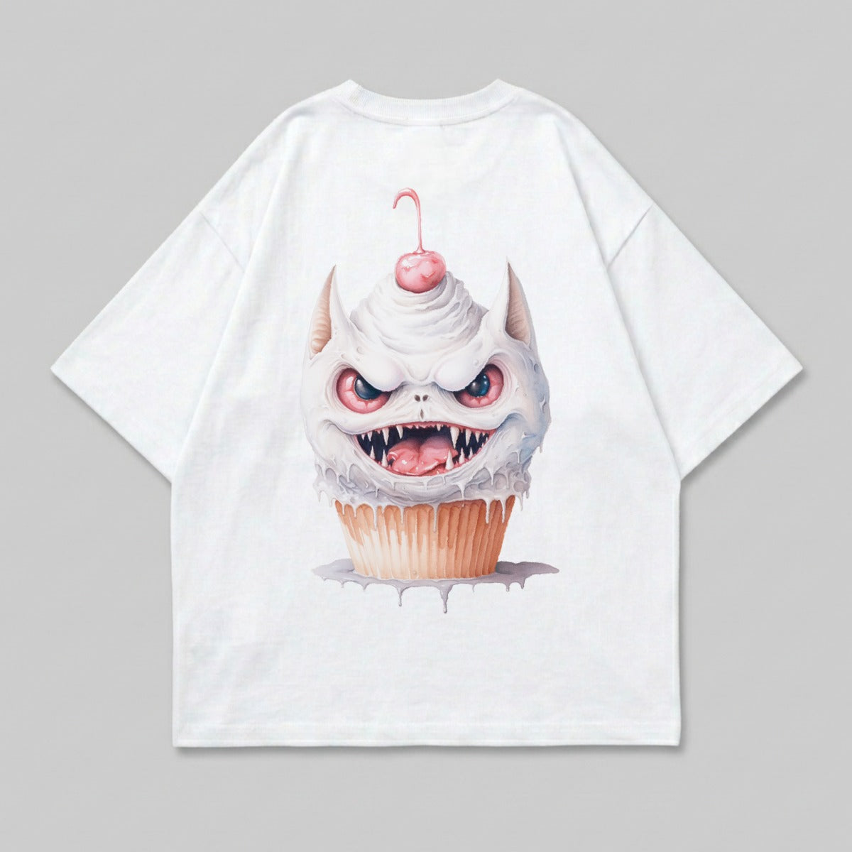 White t-shirt with a demonic cupcake graphic wearing a cherry.
