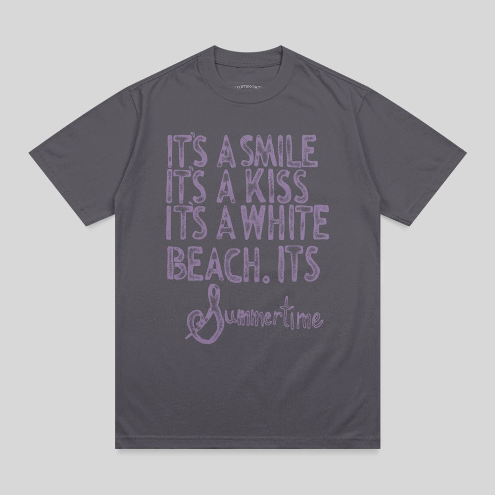 T-shirt with "It's a smile, it's a kiss, it's a white beach. It's Summertime" text.