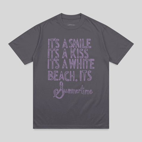 T-shirt with "It's a smile, it's a kiss, it's a white beach. It's Summertime" text.