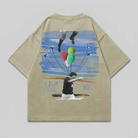T-shirt graphic with Messi, balloons, airplanes, and text.