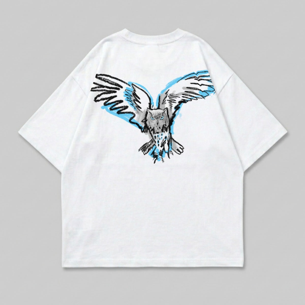 White t-shirt with a sketch of a blue and grey owl with wings spread.