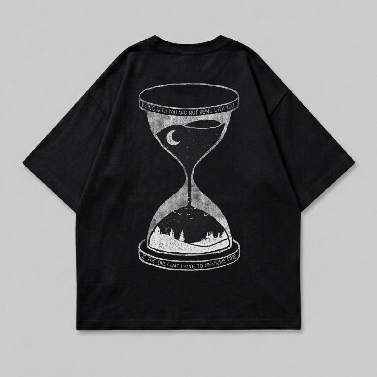 Black t-shirt with hourglass design and text about measuring time.