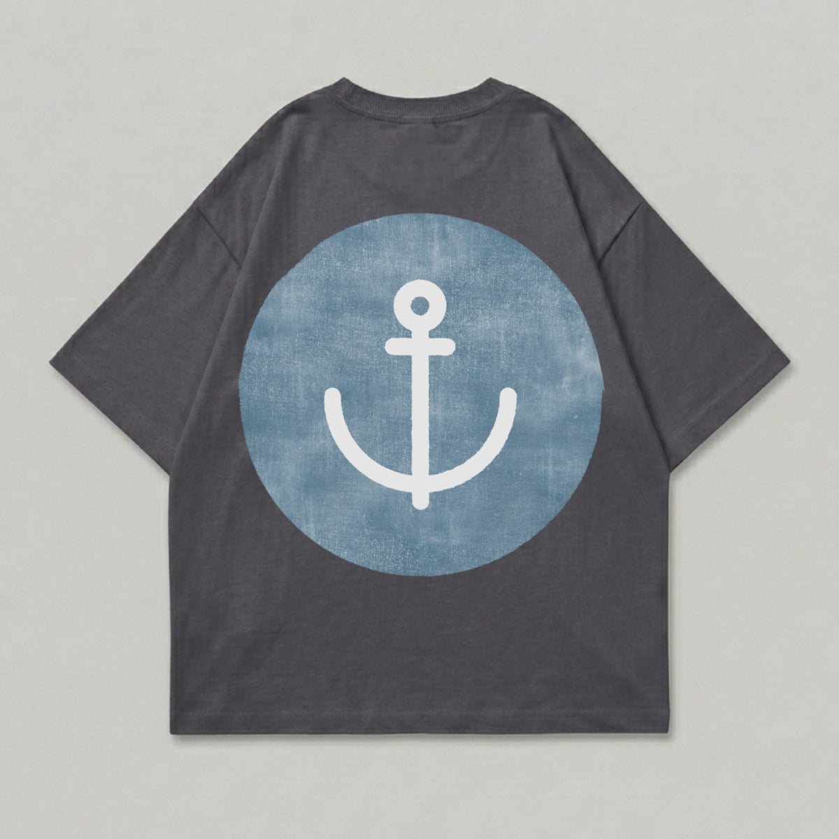 Dark grey t-shirt with a white anchor inside a blue circle on the back.