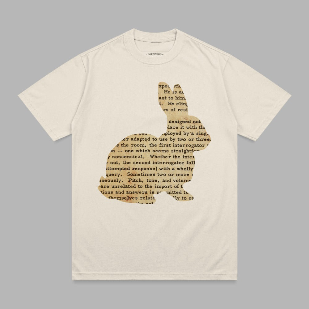 Cream t-shirt with a rabbit silhouette filled with printed text.