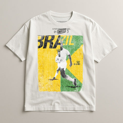 Pele in action on a white t-shirt with Brazil flag design and text.