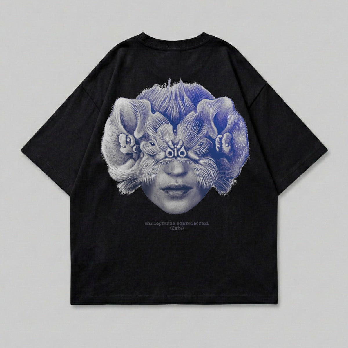 Black t-shirt with a graphic of a face superimposed with a creature's furry head.