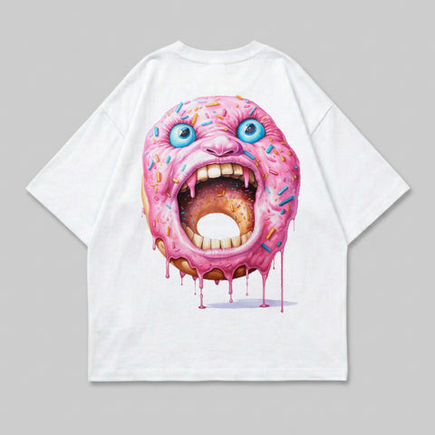 White t-shirt featuring a screaming donut with blue eyes and pink frosting.