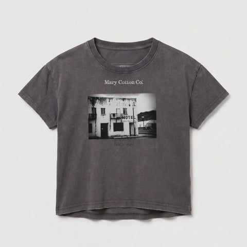 Gray t-shirt with a black and white image of a building and text.