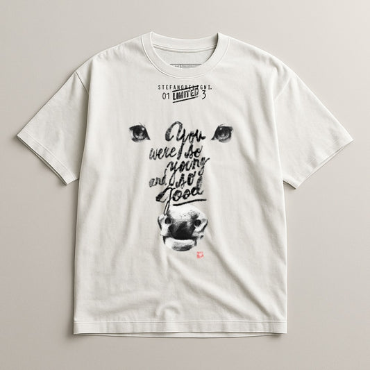 White t-shirt with stylized animal face and text "You were so young and so good".