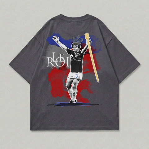 Dark grey t-shirt with graphic of football player wearing crown and holding scepter.
