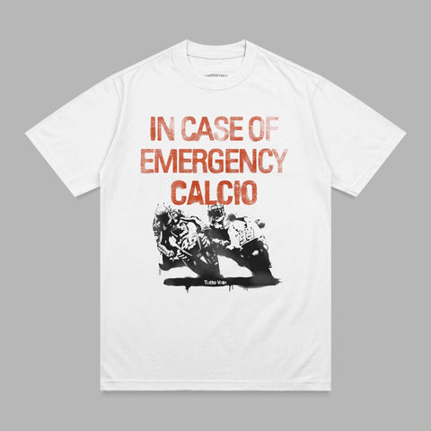 White t-shirt with red distressed text "IN CASE OF EMERGENCY CALCIO" and graphic of soccer players.