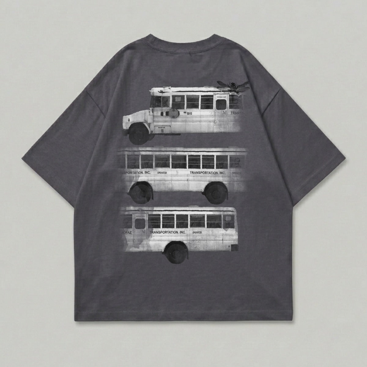 T-shirt with three black and white buses stacked vertically.