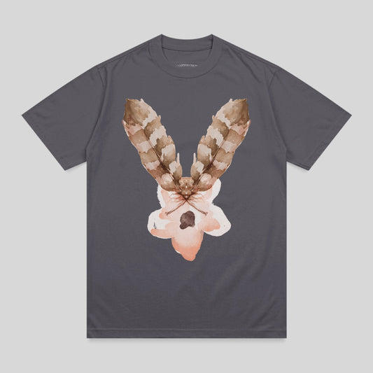 T-shirt with a watercolor moth design featuring feather-like wings and a pale pink body.
