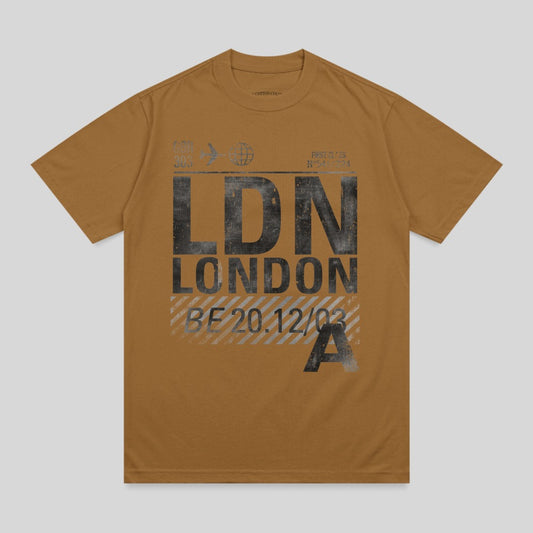 Brown t-shirt with "LDN LONDON" and flight details graphic.