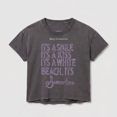 Dark grey t-shirt with "Mary Cotton Co." and purple text "IT'S A SMILE IT'S A KISS IT'S A WHITE BEACH. ITS Summertime".
