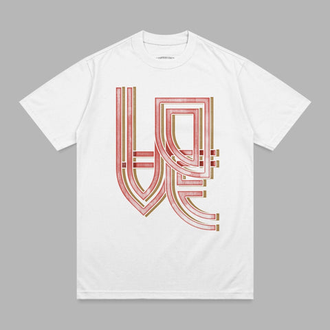 White t-shirt with abstract red and gold geometric graphic design.