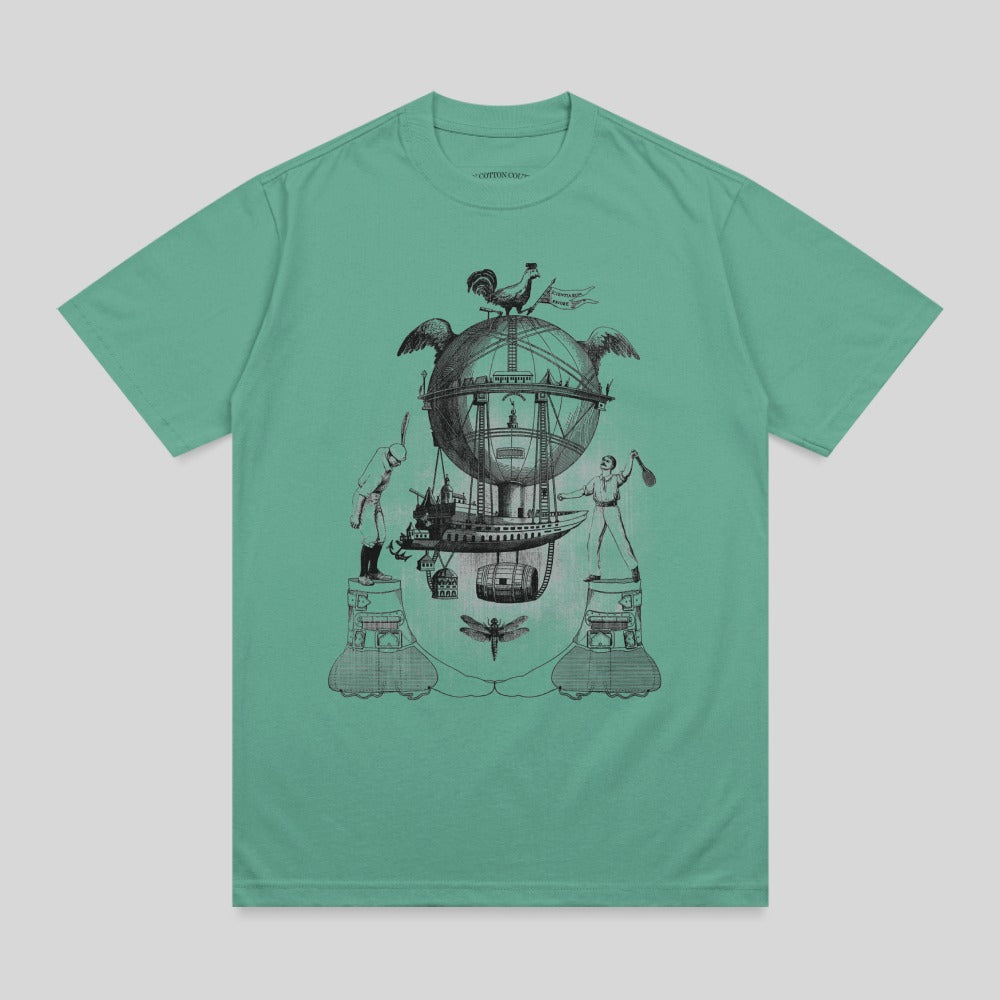 Graphic tee with fantastical hot air balloon, figures, and dragonflies.