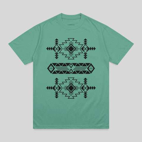 Teal t-shirt with black geometric Southwestern-inspired pattern.