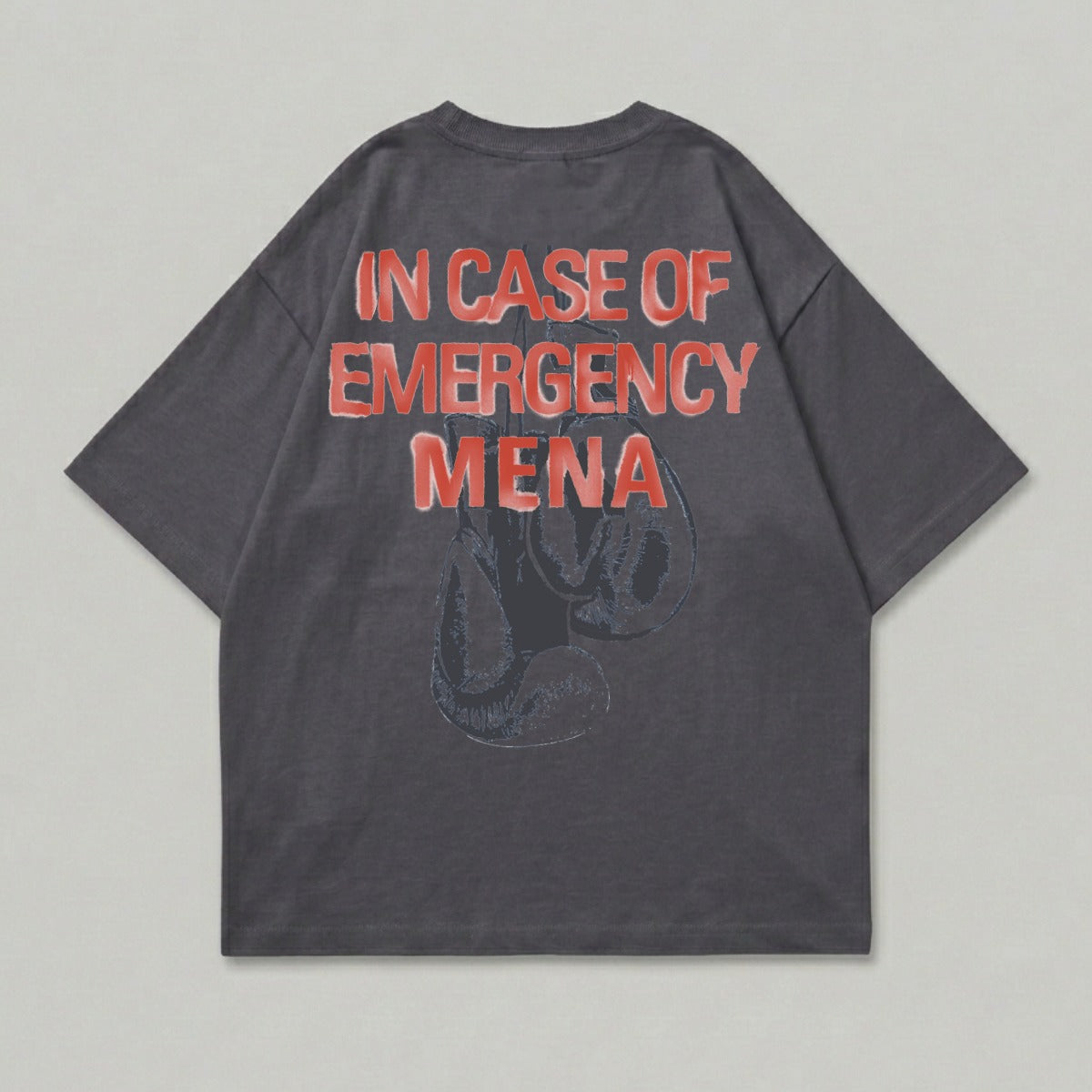 Dark grey t-shirt with red "IN CASE OF EMERGENCY MENA" text and boxing gloves graphic.