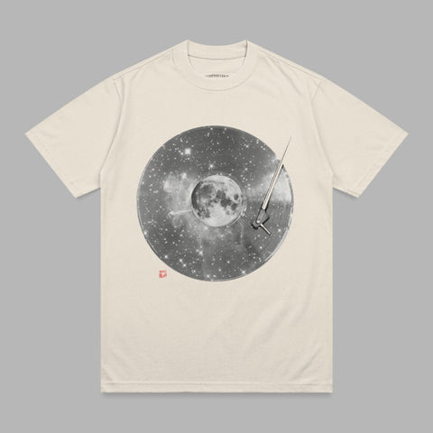 Cream t-shirt with a celestial vinyl record and moon graphic.