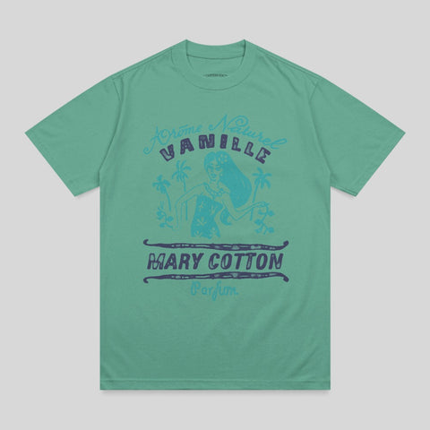 Green t-shirt with vintage tropical perfume advertisement graphic.