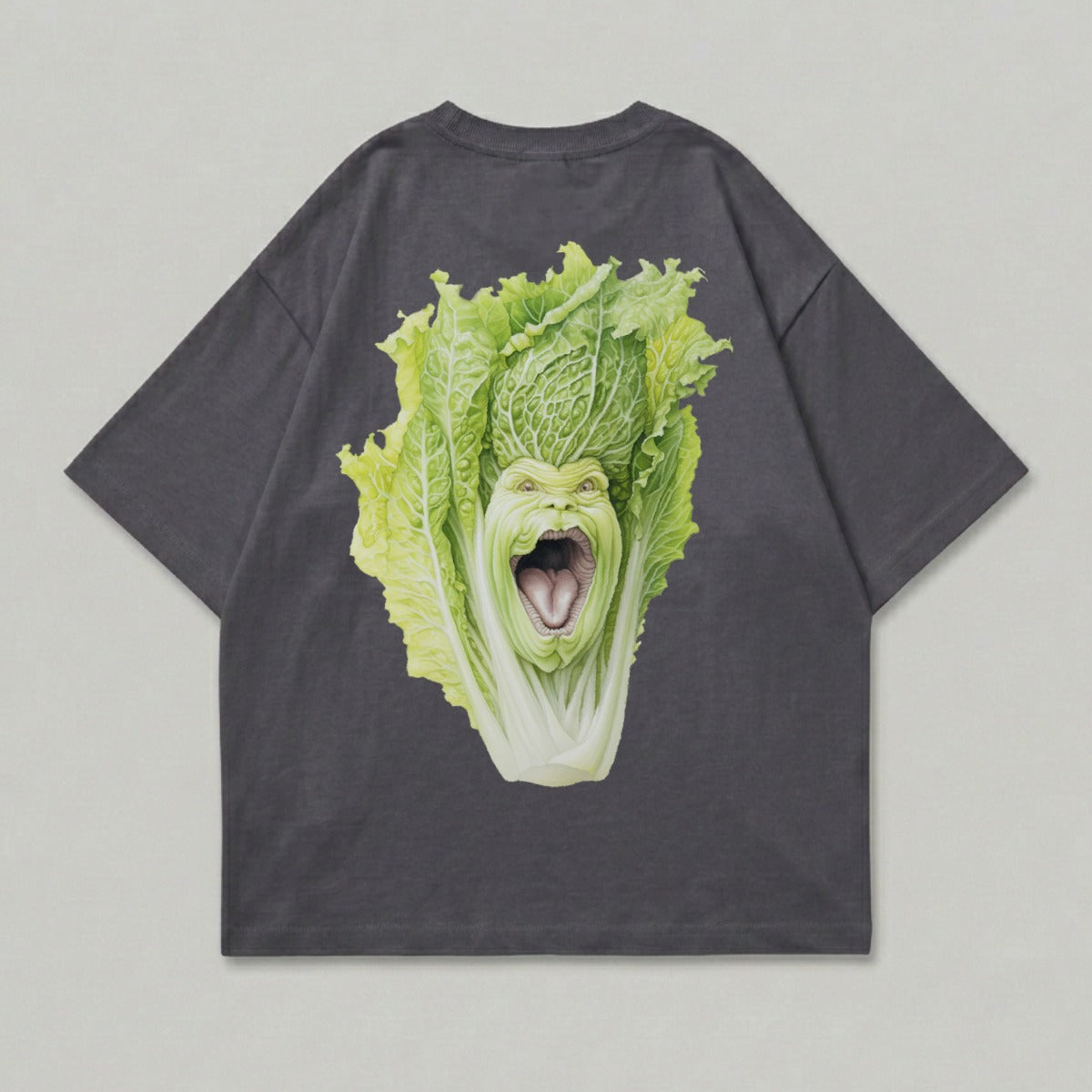 Dark grey t-shirt with a cartoonish, screaming napa cabbage head graphic.