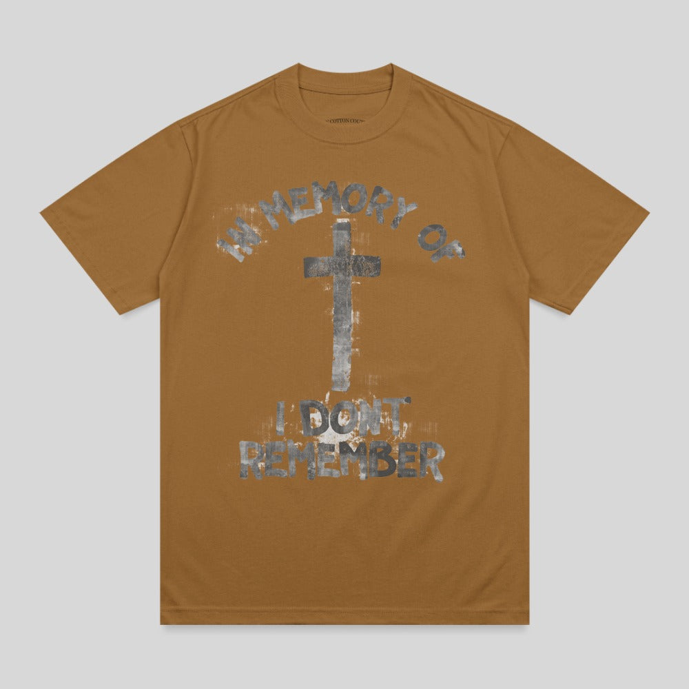 Brown t-shirt with "IN MEMORY OF I DON'T REMEMBER" and a cross graphic.