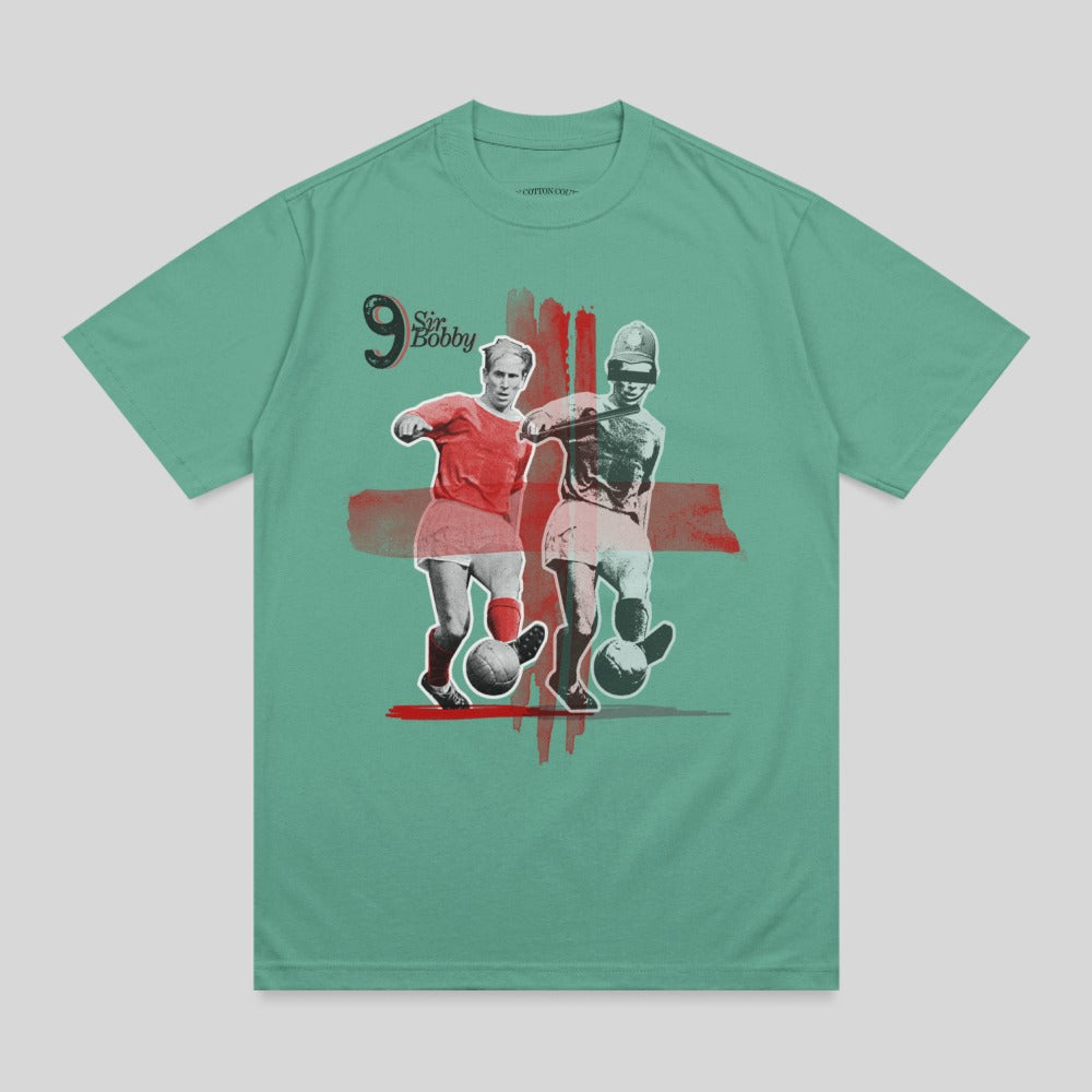 T-shirt graphic featuring Sir Bobby Charlton in a football match.