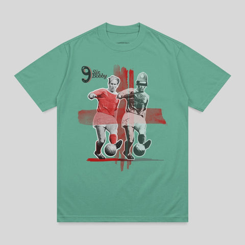 T-shirt graphic featuring Sir Bobby Charlton in a football match.