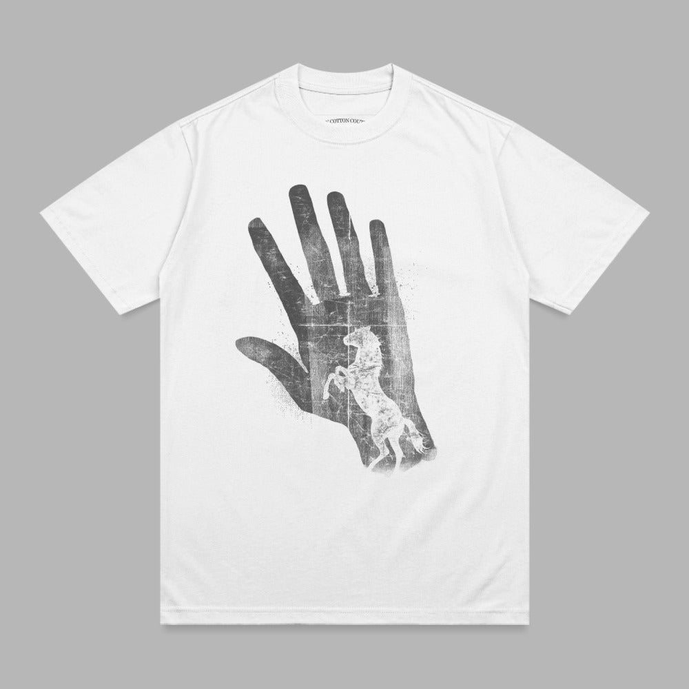 White t-shirt with a distressed graphic of a horse within a hand.