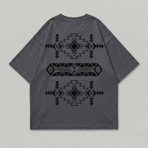 Dark grey t-shirt with black geometric tribal pattern design on back.