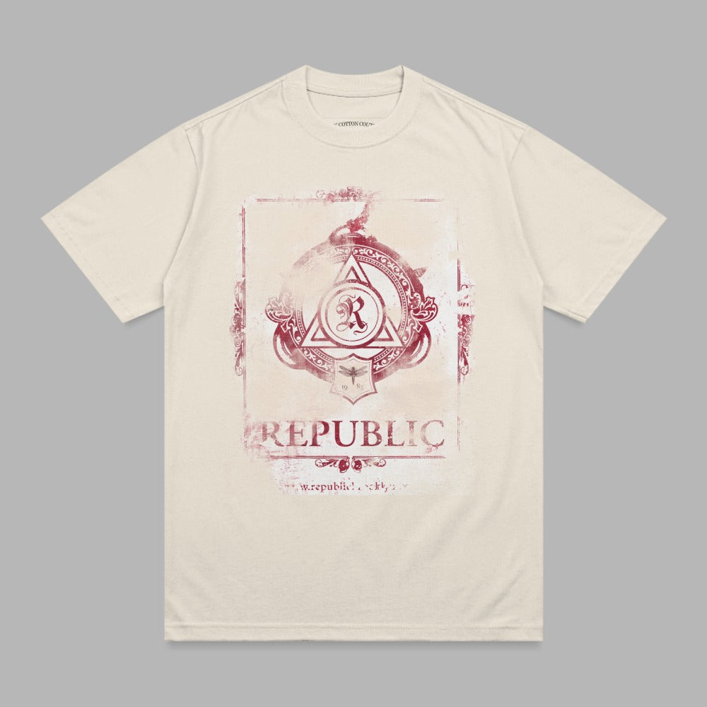 Cream t-shirt with distressed red "REPUBLIC" graphic and circular emblem.