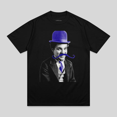 Black t-shirt featuring Charlie Chaplin with a blue mustache and bowler hat.