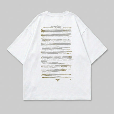 T-shirt with "promise" text and blurred printed words on the back.