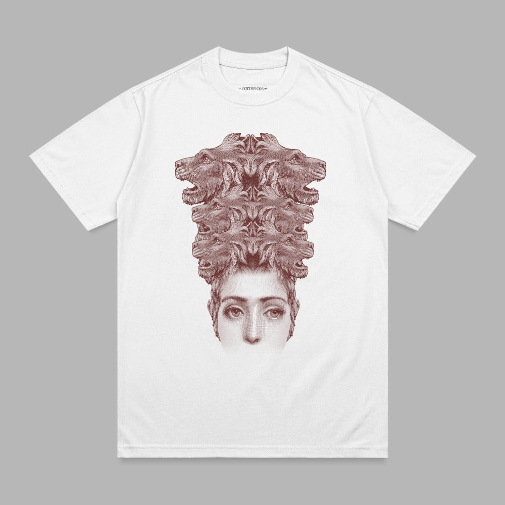 White t-shirt with a graphic of a woman's face with multiple wolf heads above her.