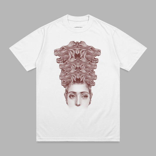 White t-shirt with a graphic of a woman's face with multiple wolf heads above her.