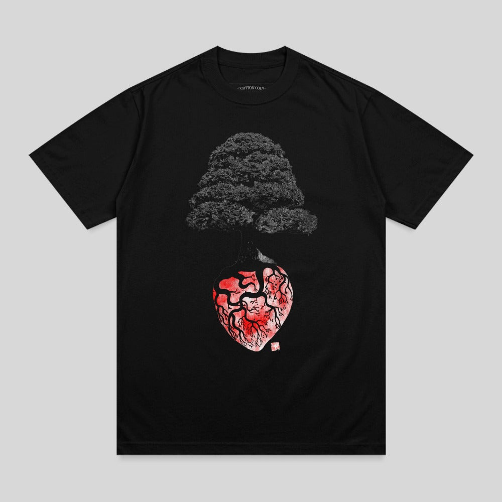 Black t-shirt with graphic of a stylized anatomical heart entwined with a tree.