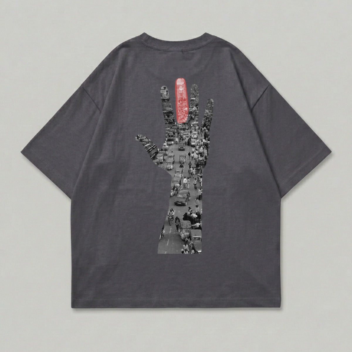 Dark grey t-shirt with a graphic of a traffic jam within a hand silhouette.