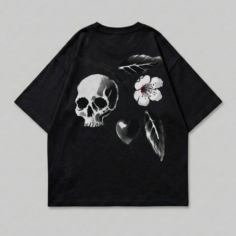 Black t-shirt with a skull, heart, flower, and leaf design.