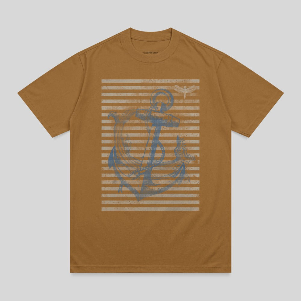 Brown t-shirt with distressed anchor and dragonfly graphic on striped background.