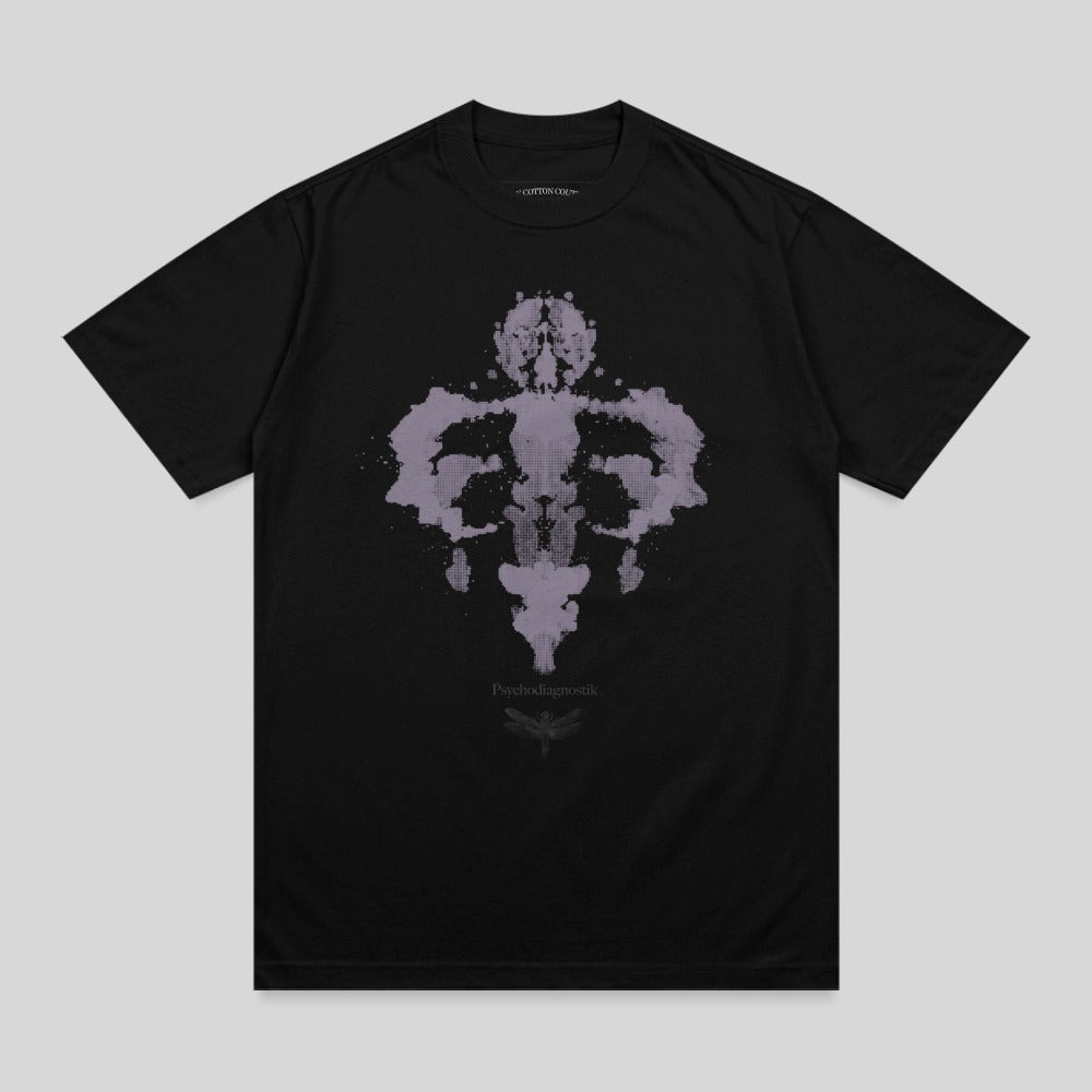 Black t-shirt with a purple Rorschach-like inkblot design.
