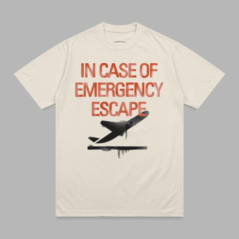 Cream t-shirt with "IN CASE OF EMERGENCY ESCAPE" text and a black airplane graphic.