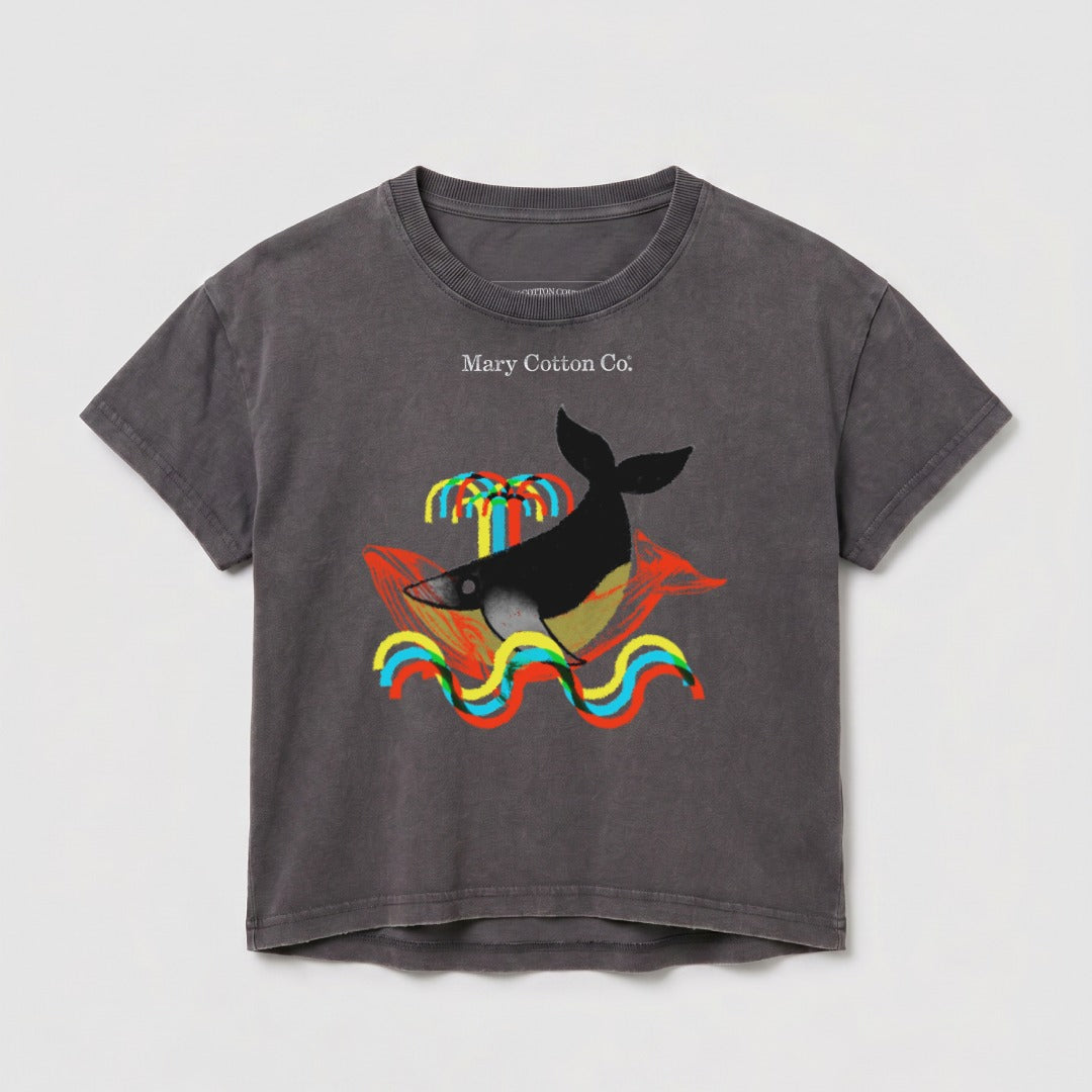 Gray t-shirt with a graphic of a whale swimming through colorful wavy lines and palm trees.