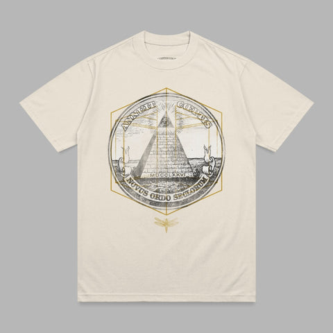 Cream t-shirt with an all-seeing eye pyramid emblem and "Novus Ordo Seclorum" text.