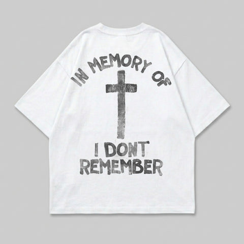 White t-shirt with black cross and "IN MEMORY OF I DON'T REMEMBER" text.