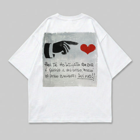 White t-shirt with hand pointing to a red heart and Italian text.